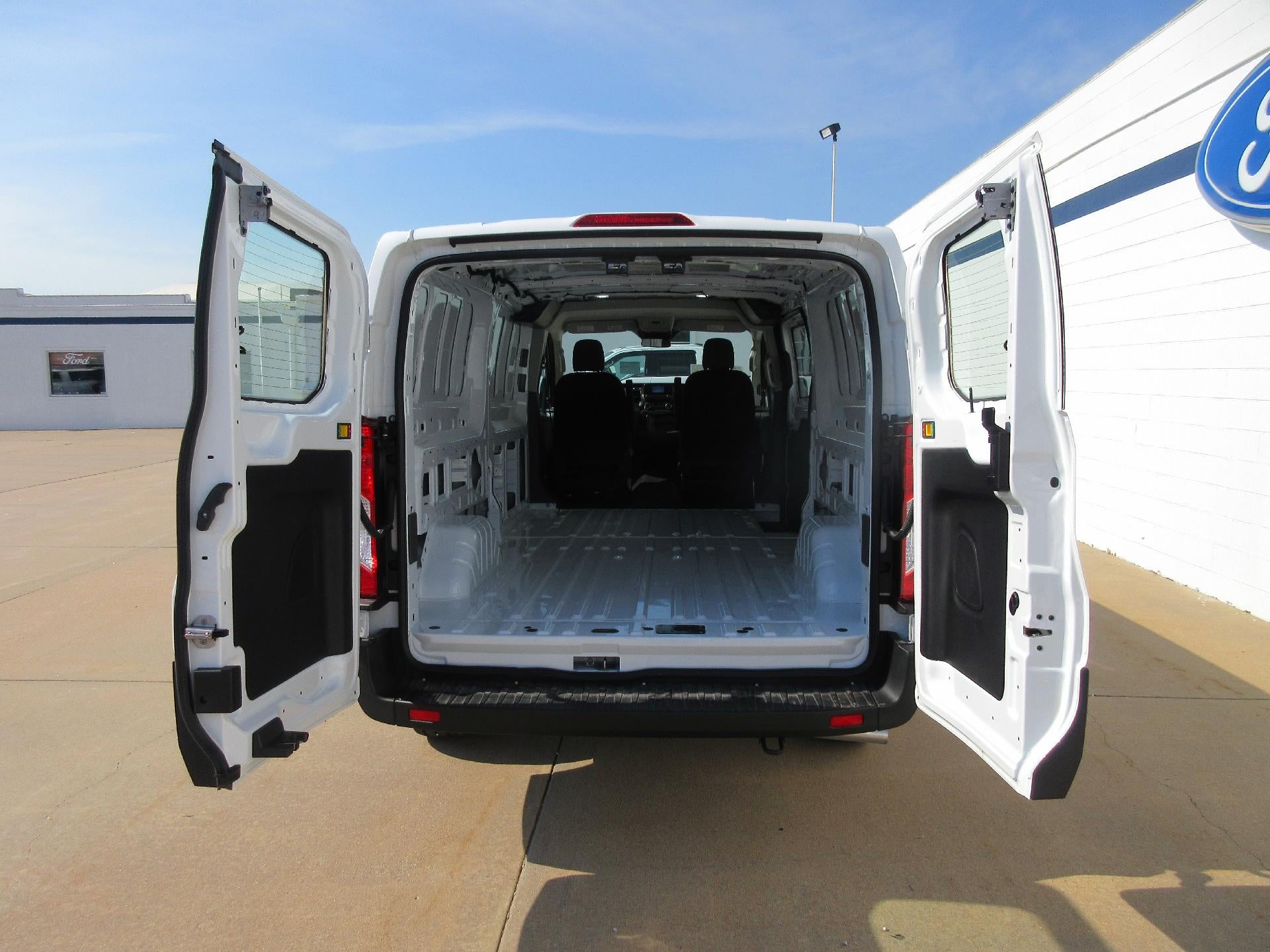 2023 Ford Transit Cargo Van T-150 148" Low Rf 8670 GVWR AWD