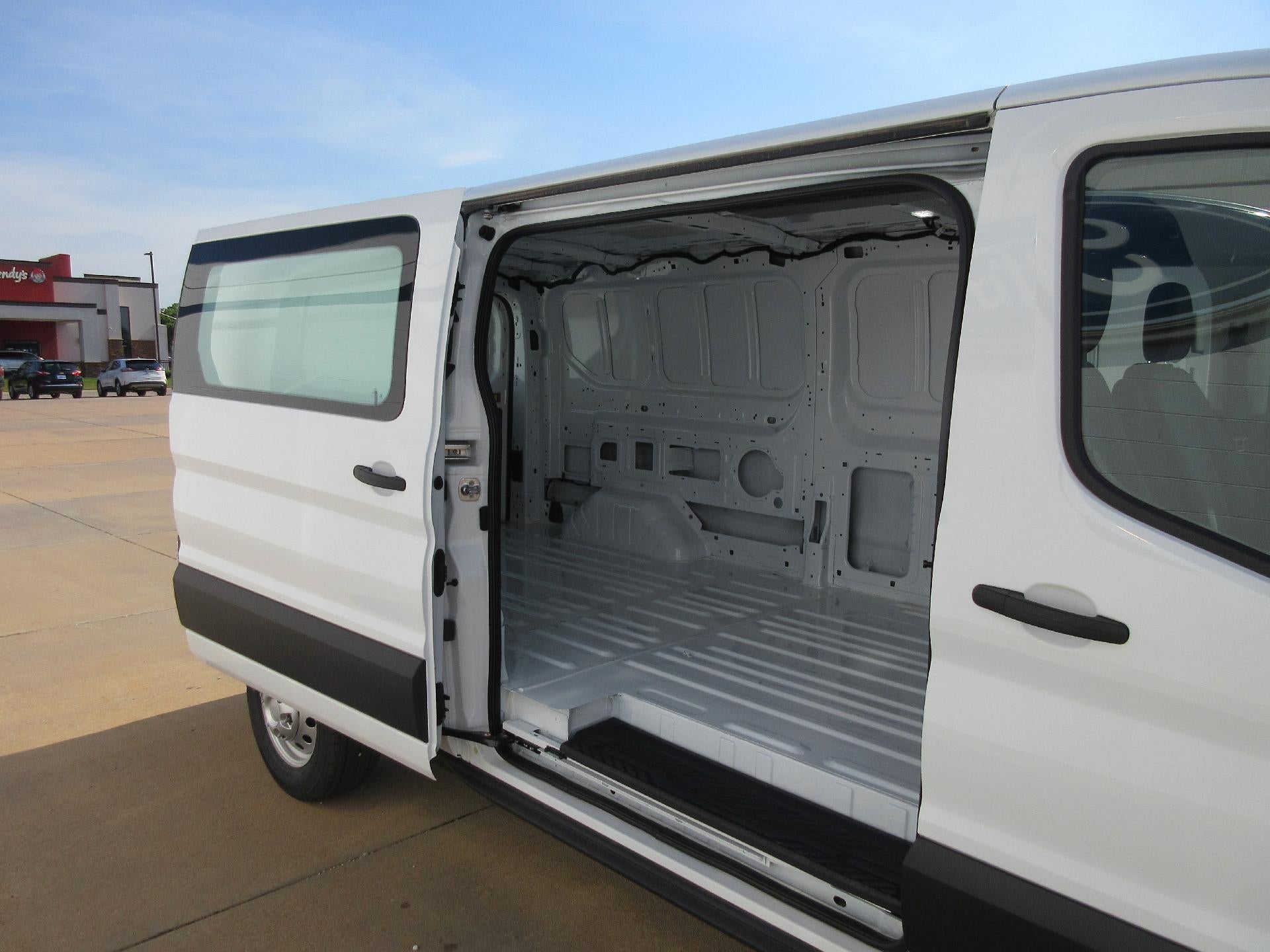 2023 Ford Transit Cargo Van T-150 148" Low Rf 8670 GVWR AWD