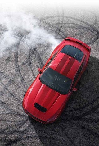 Overhead view of a 2024 Ford Mustang® model with tire tracks on pavement | Kline Ford in Winfield KS